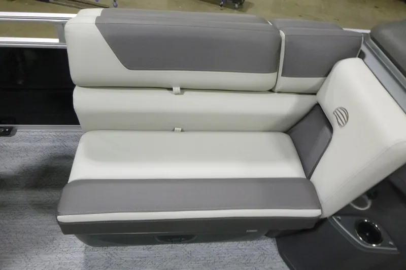 Slide: The Image of 2026 Sun Tracker Fishin' Barge 22 DLX, gray and white seating detail. - 8