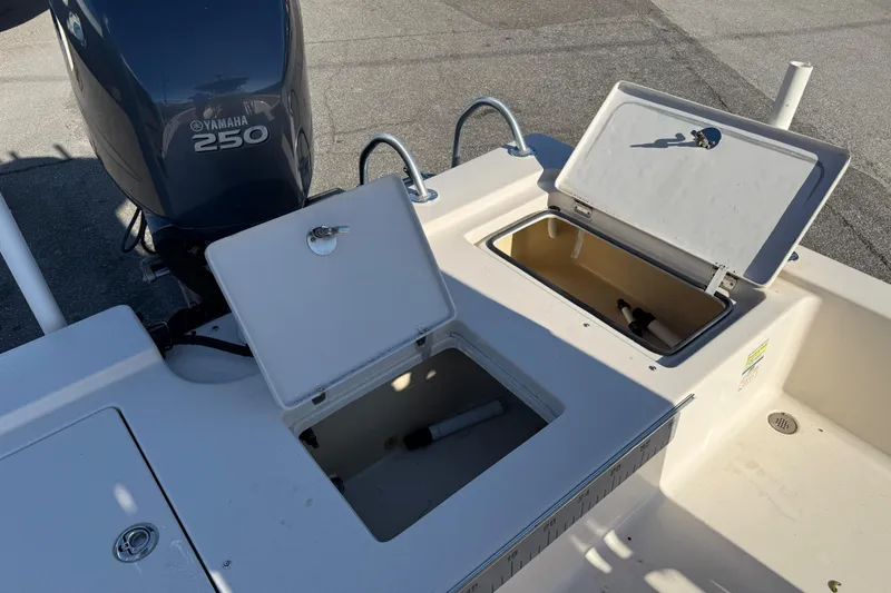 Slide: The Image of 2007 Pathfinder 2400 Tournament Edition boat with Yamaha 250 engine, open storage compartments. - 6