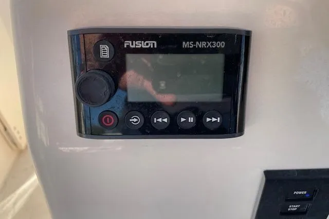 Slide: The Image of Fusion MS-NRX300 marine stereo on 2022 Grady-White Freedom 235 boat dashboard. - 25