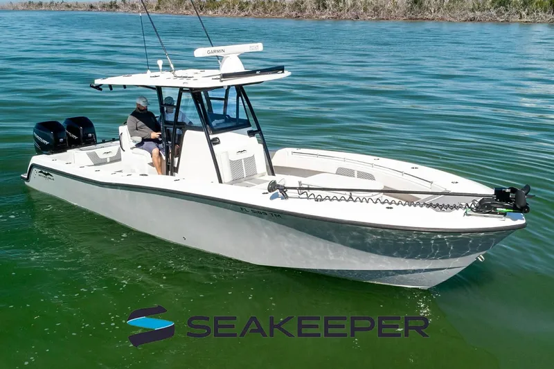 The Image of 2022 Invincible 33 Open Fisherman boat on water, featuring Seakeeper technology. - 0