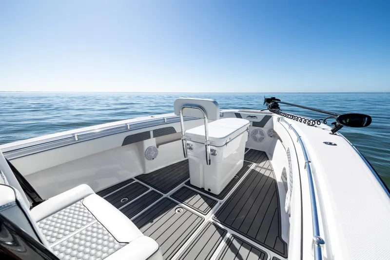 Slide: The Image of 2022 Invincible 33 Open Fisherman boat interior on calm ocean waters. - 16