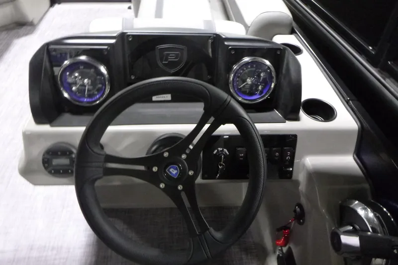 Slide: The Image of Steering console of 2026 Premier 220 SUNSCAPE RL boat with modern controls. - 15