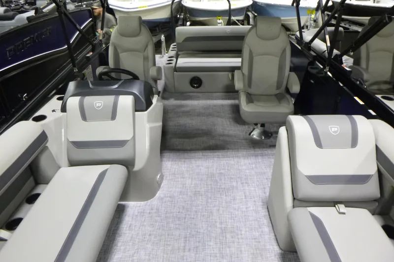 Slide: The Image of 2026 Premier 220 SUNSCAPE RL boat interior with modern seating and sleek design. - 4