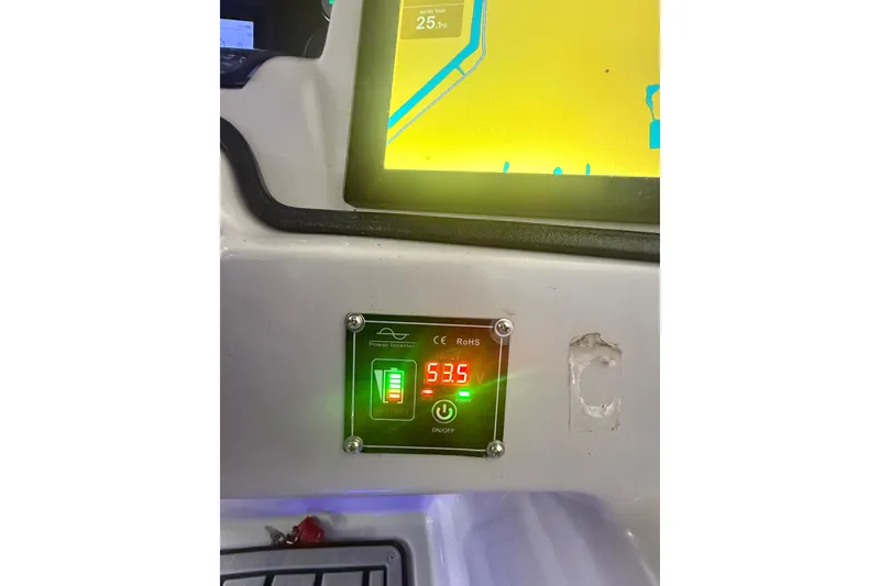 Slide: The Image of Control panel of 2023 Starcraft SLS 3 Q DH showing battery voltage at 53.5V. - 11
