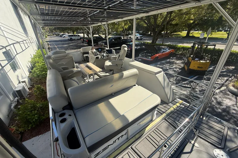 Slide: The Image of 2023 Starcraft SLS 3 Q DH pontoon boat with spacious seating and modern design. - 25