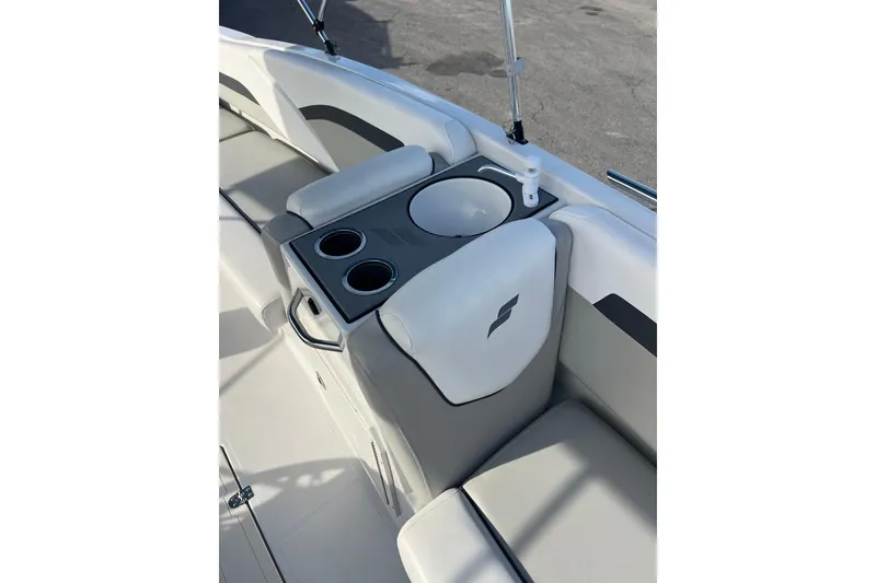 Slide: The Image of 2022 Starcraft SVX 191 OB boat interior with cup holders and seating. - 11