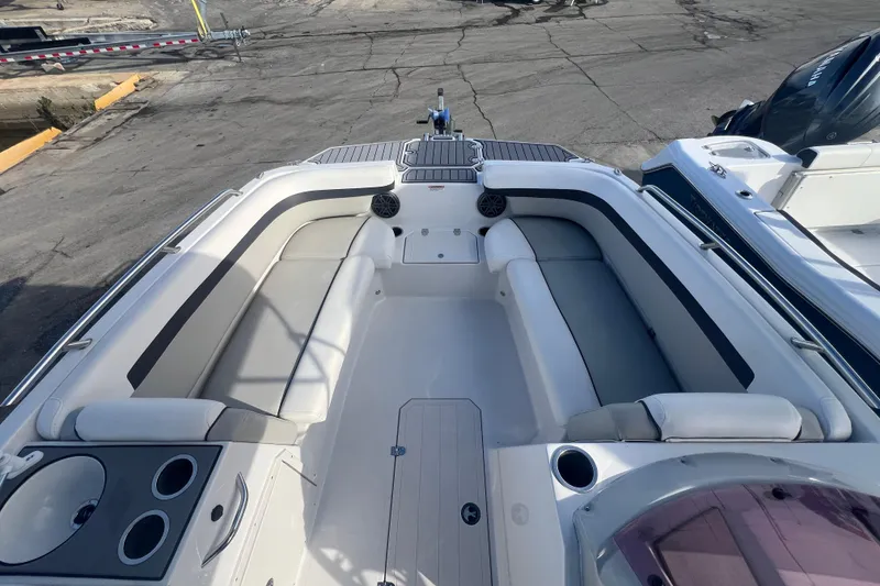 Slide: The Image of 2022 Starcraft SVX 191 OB boat interior with spacious seating and cup holders. - 7