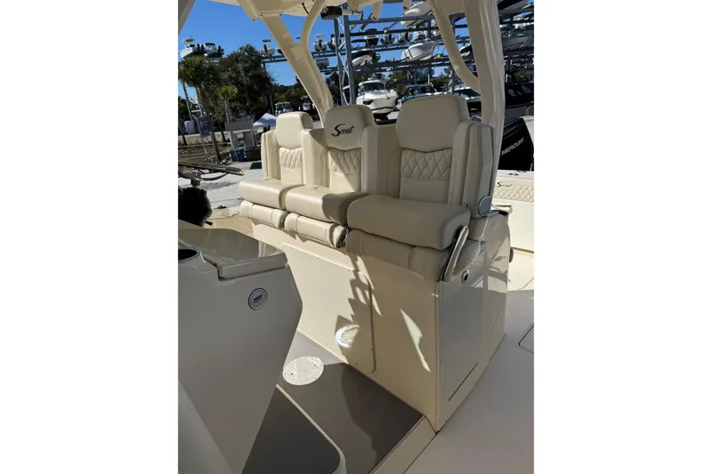 Slide: The Image of 2025 Scout 357 LXF boat interior with luxurious seating and modern design. - 12