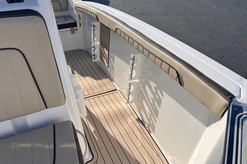 Slide: The Image of Interior of 2026 Yamaha 255 FSH Sport E with sleek seating. - 13