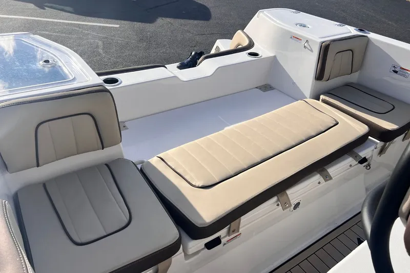Slide: The Image of Interior of Yamaha Boats 255 FSH Sport E 2026 with beige seating. - 7