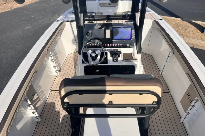 Slide: The Image of Interior view of the 2026 Yamaha 255 FSH Sport E boat. - 9