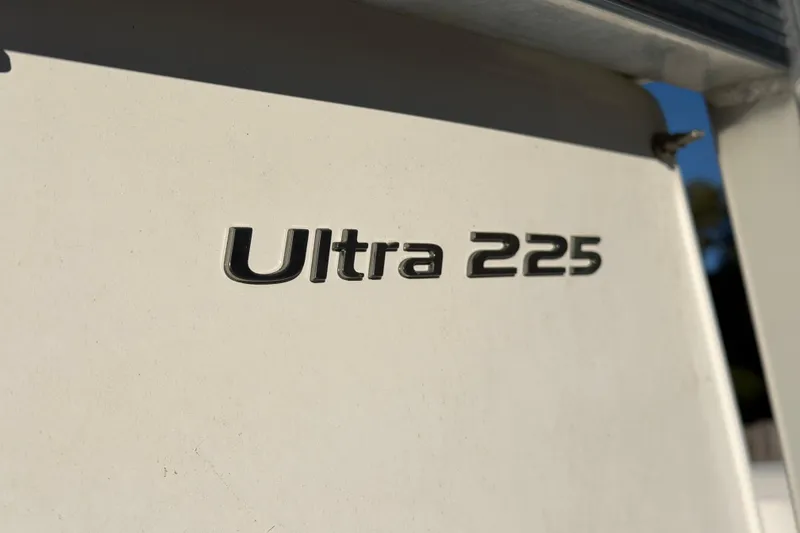 Slide: The Image of Close-up of 2015 Sea Hunt Ultra 225 boat model nameplate. - 37