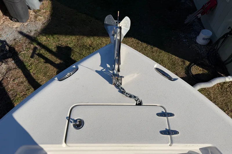Slide: The Image of Bow view of a 2015 Sea Hunt Ultra 225 boat with anchor and chain. - 45