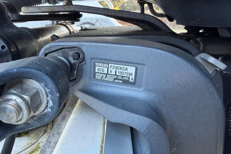 Slide: The Image of Close-up of Yamaha F250XCA engine on 2015 Sea Hunt Ultra 225 boat. - 63