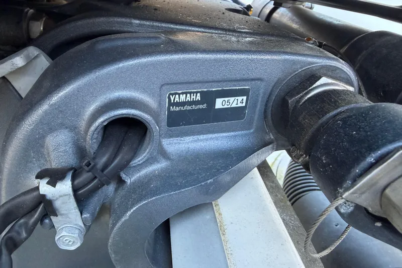 Slide: The Image of Close-up of Yamaha engine part on 2015 Sea Hunt Ultra 225 boat. - 64