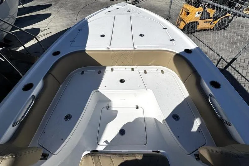 Slide: The Image of 2026 Blazer Bay 2400 boat interior with seating and storage compartments. - 6