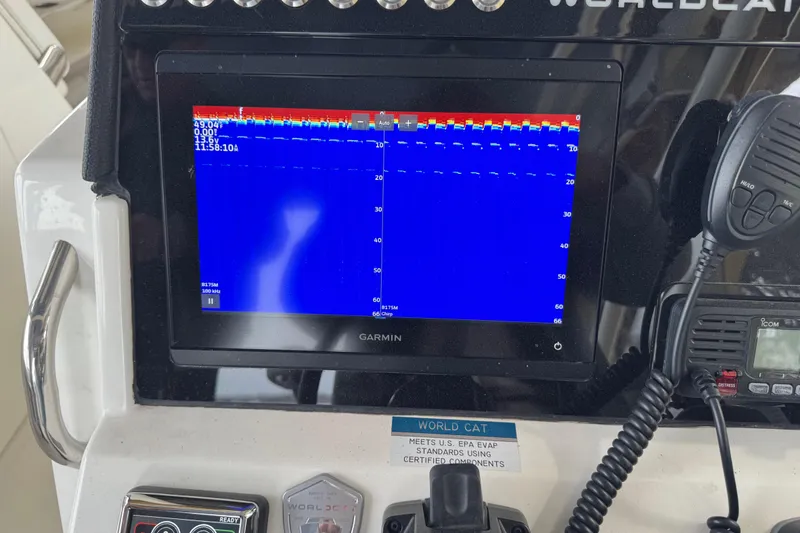 Slide: The Image of Garmin display on 2023 World Cat 280 DC-X boat dashboard with marine electronics. - 15