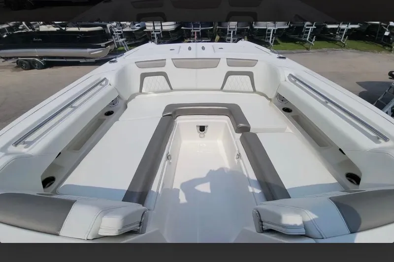 Slide: The Image of 2023 World Cat 280 DC-X boat interior with spacious seating and modern design. - 7