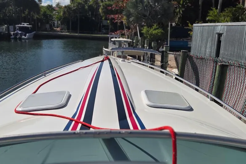 Slide: The Image of White leather seating on a 2004 Formula 292 FASTech boat interior. - 11