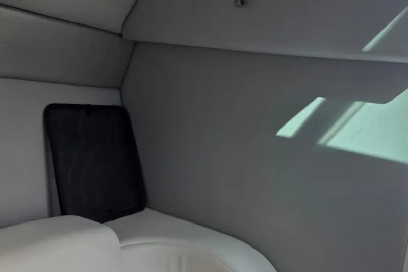 Slide: The Image of 2004 Formula 292 FASTech boat emblem on a sleek white surface. - 14