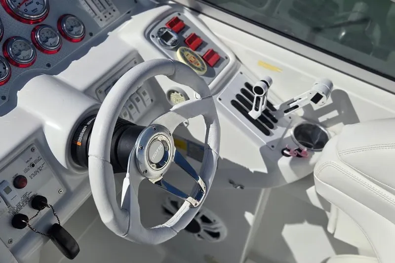 Slide: The Image of 2004 Formula 292 FASTech boat interior with sink and control panel. - 15