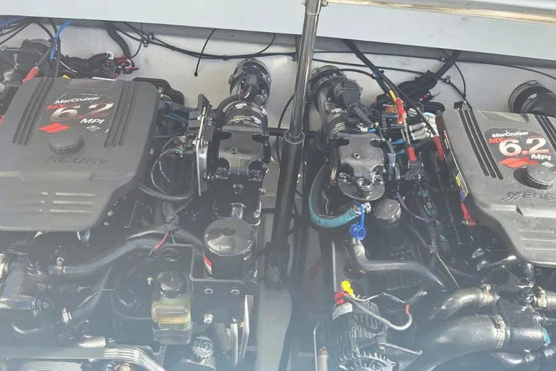 Slide: The Image of 2004 Formula 292 FASTech speedboat docked, featuring sleek design and vibrant graphics. - 19