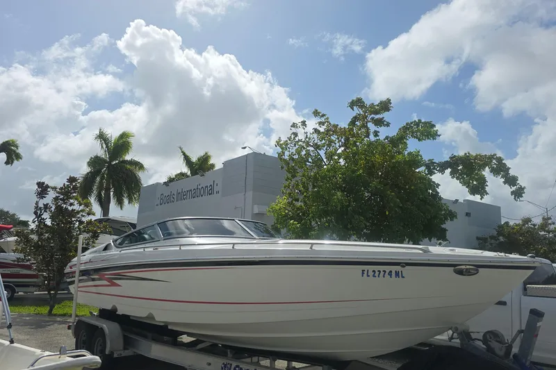 Slide: The Image of 2004 Formula 292 FASTech boat on trailer at Boats International dealership. - 2