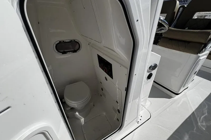 Slide: The Image of 2026 Blazer Bay Makaira 2800 boat interior with compact marine toilet. - 11