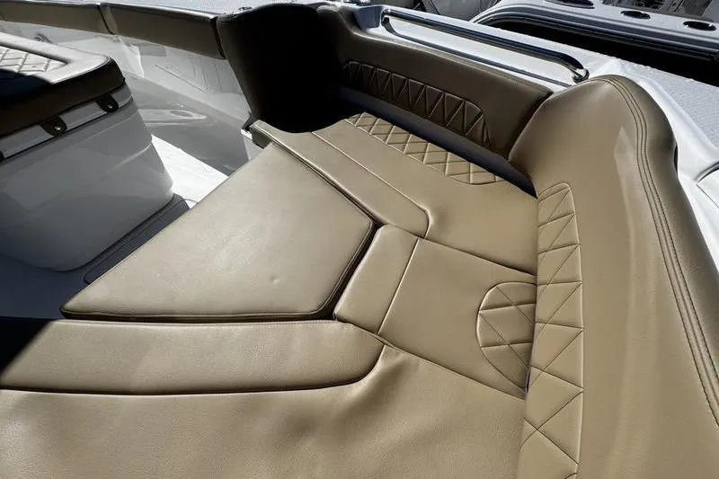 Slide: The Image of Luxurious seating on 2026 Blazer Bay Makaira 2800 boat, featuring tan leather upholstery. - 6