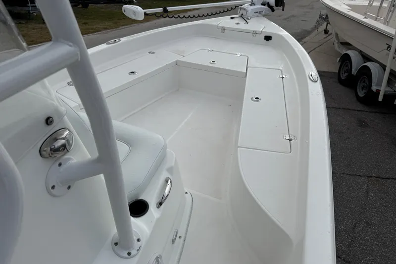 Slide: The Image of 2022 Clearwater 2100 Baystar boat interior with spacious deck and seating. - 10