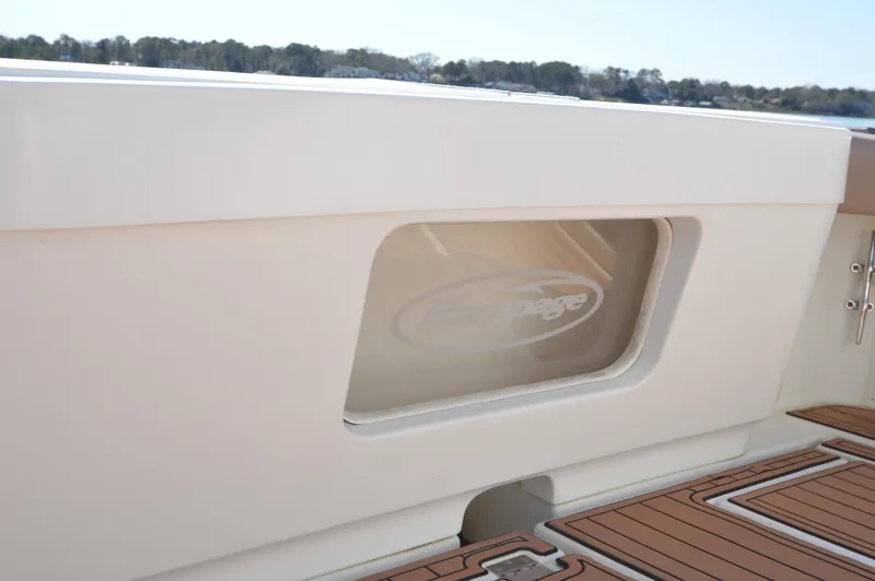 Slide: The Image of Rampage 38 Express 2002 boat deck with logo. - 14