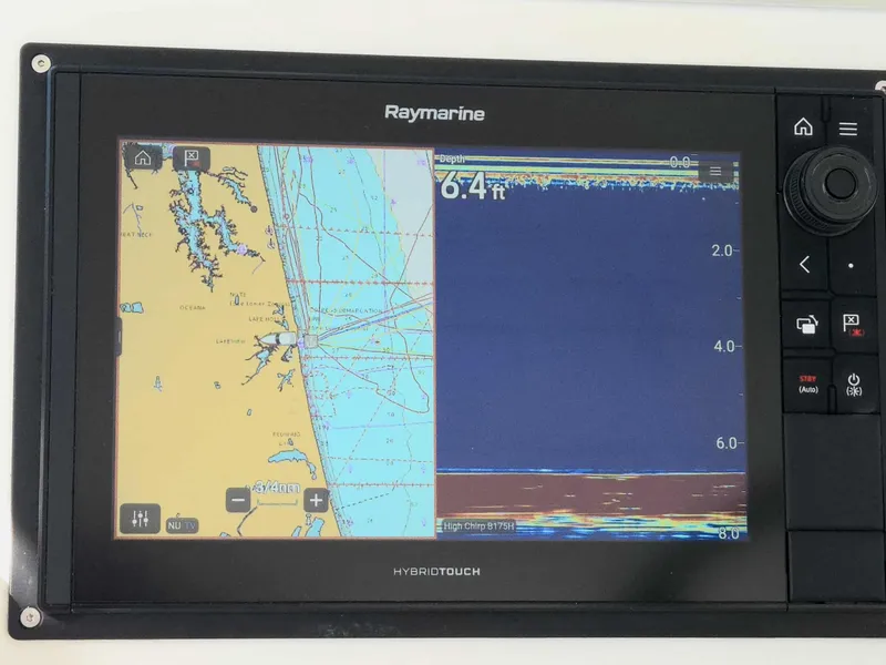 Slide: The Image of Raymarine Hybridtouch on 2002 Rampage 38 Express, displaying nautical chart and sonar. - 30