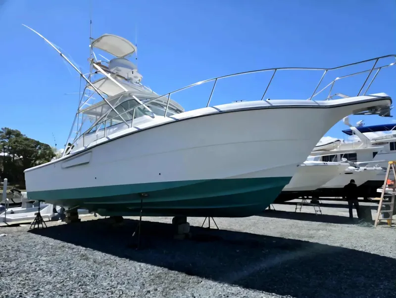 Slide: The Image of 2002 Rampage 38 Express boat on dry dock. - 4