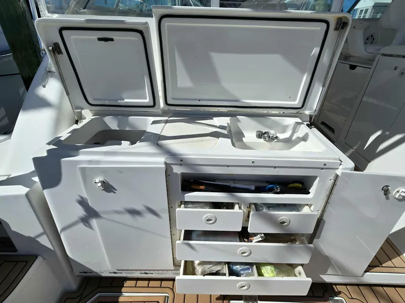 Slide: The Image of Galley area on a 2002 Rampage 38 Express boat. - 9