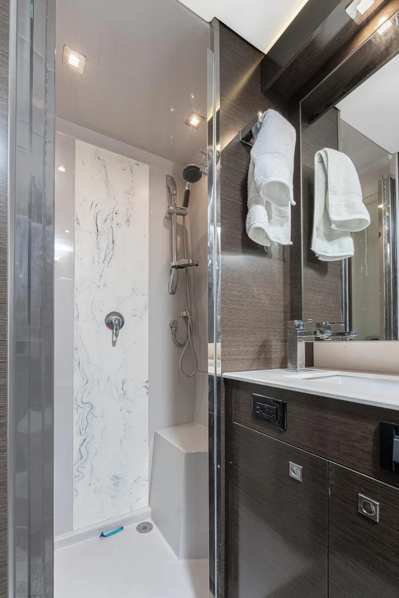 Slide: The Image of Luxurious bathroom in 2018 Cruisers Yachts 50 Cantius with modern shower and elegant fixtures. - 14