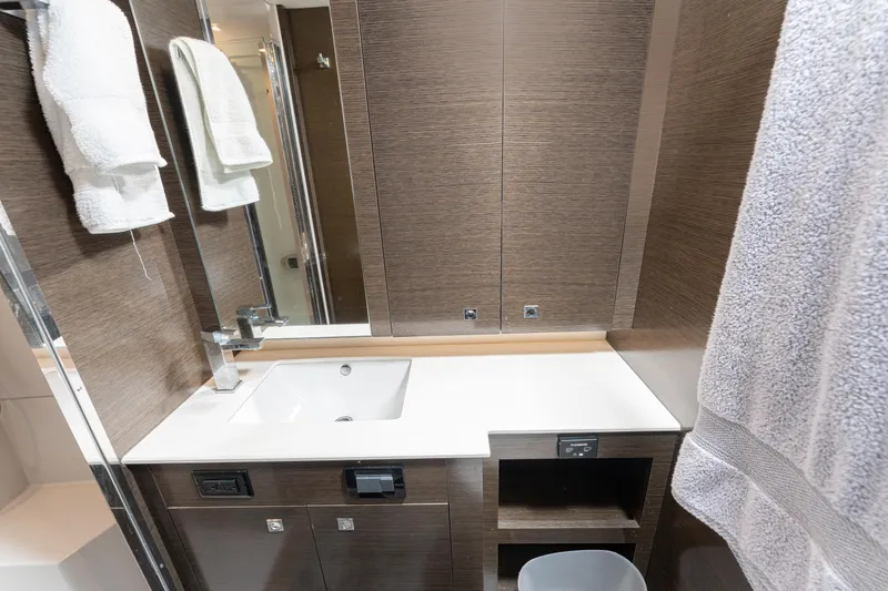 Slide: The Image of Luxurious bathroom in 2018 Cruisers Yachts 50 Cantius with modern fixtures and elegant design. - 15