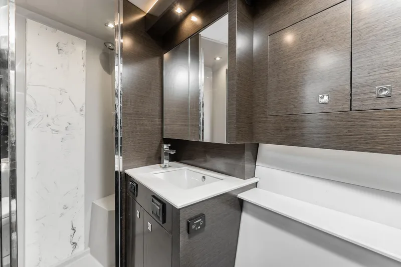 Slide: The Image of Luxurious bathroom interior of 2018 Cruisers Yachts 50 Cantius with modern fixtures and sleek design. - 20
