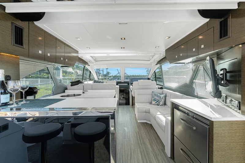 Slide: The Image of Luxurious interior of 2018 Cruisers Yachts 50 Cantius with modern seating and sleek design. - 48