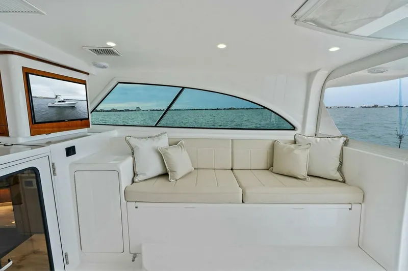Slide: The Image of Interior of 2021 Viking 46 Billfish yacht with seating and ocean view. - 14