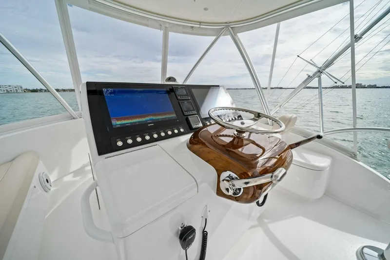 Slide: The Image of Helm of 2021 Viking 46 Billfish yacht with modern navigation equipment. - 26