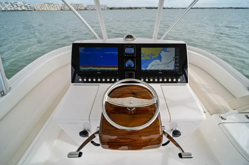 Slide: The Image of Helm of 2021 Viking 46 Billfish with advanced navigation displays. - 27