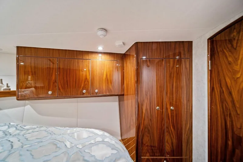 Slide: The Image of Luxurious wood cabinetry in 2021 Viking 46 Billfish yacht interior bedroom. - 54