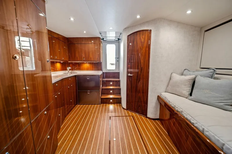 Slide: The Image of Luxurious interior of 2021 Viking 46 Billfish yacht with polished wood finishes. - 55