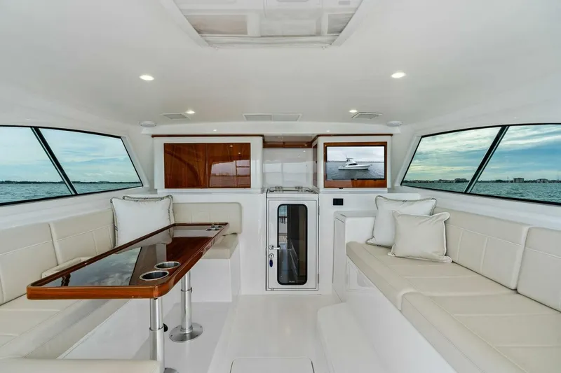 Slide: The Image of Luxurious interior of 2021 Viking 46 Billfish yacht with elegant seating and panoramic windows. - 6