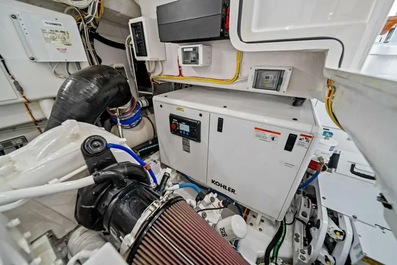 Slide: The Image of Engine room of 2021 Viking 46 Billfish with Kohler generator and wiring. - 72