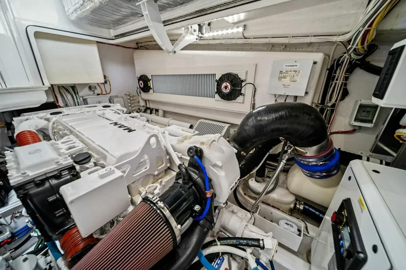 Slide: The Image of Engine room of 2021 Viking 46 Billfish yacht, showcasing advanced machinery and components. - 73