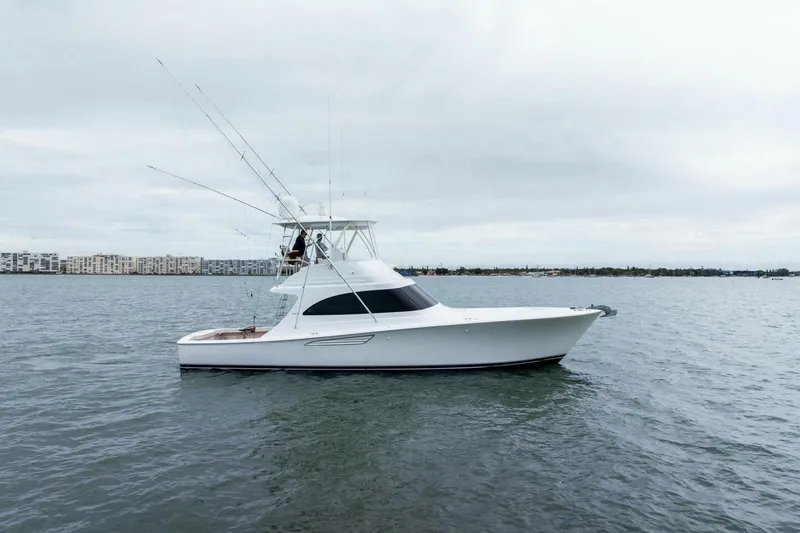 Slide: The Image of 2021 Viking 46 Billfish yacht on calm waters, overcast sky in the background. - 79
