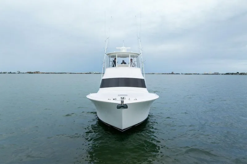 Slide: The Image of 2021 Viking 46 Billfish yacht on calm waters, front view. - 80