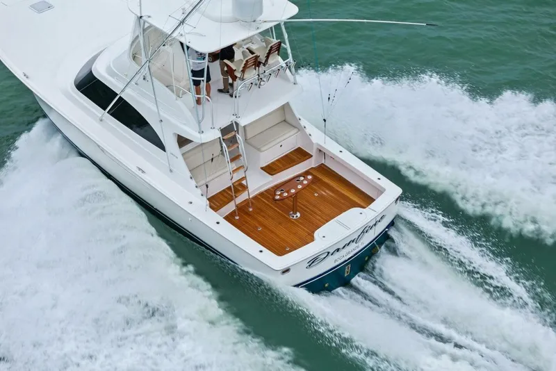 Slide: The Image of Aerial view of 2021 Viking 46 Billfish yacht cruising on water. - 90