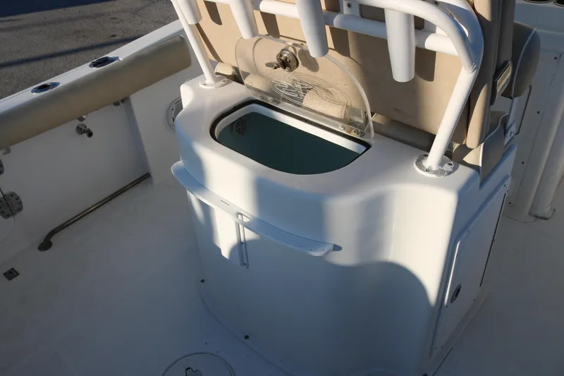 Slide: The Image of 2016 Sea Hunt Gamefish 25 boat interior with livewell and rod holders. - 10